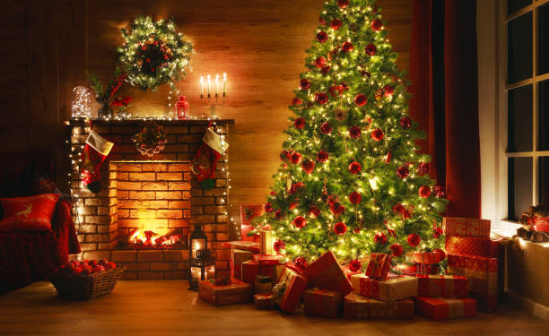 interior+christmas.+magic+glowing+tree%2C+fireplace%2C+gifts+in++dark+at+night